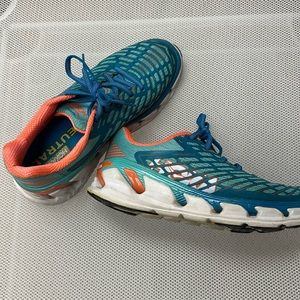 Hoka turquoise/orange accents running athletic shoe